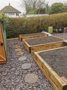 Raised Bed Planter With Railway Sleepers and Stepping Stones